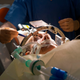 Stereotactic Neurosurgery operation, Pasteur 2 Hospital, Nice, France. A patient with Parkinsons disease is being treated with deep brain stimulation by implanting electrodes in brain and modulating cerebral electrical activity.
